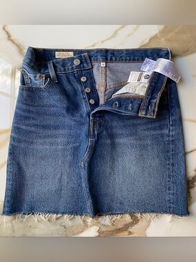 Levi's High Rise Deconstructed Skirt in Medium Wash W/Distressed Hem - Size 26